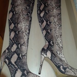 Snake print boots size 10...